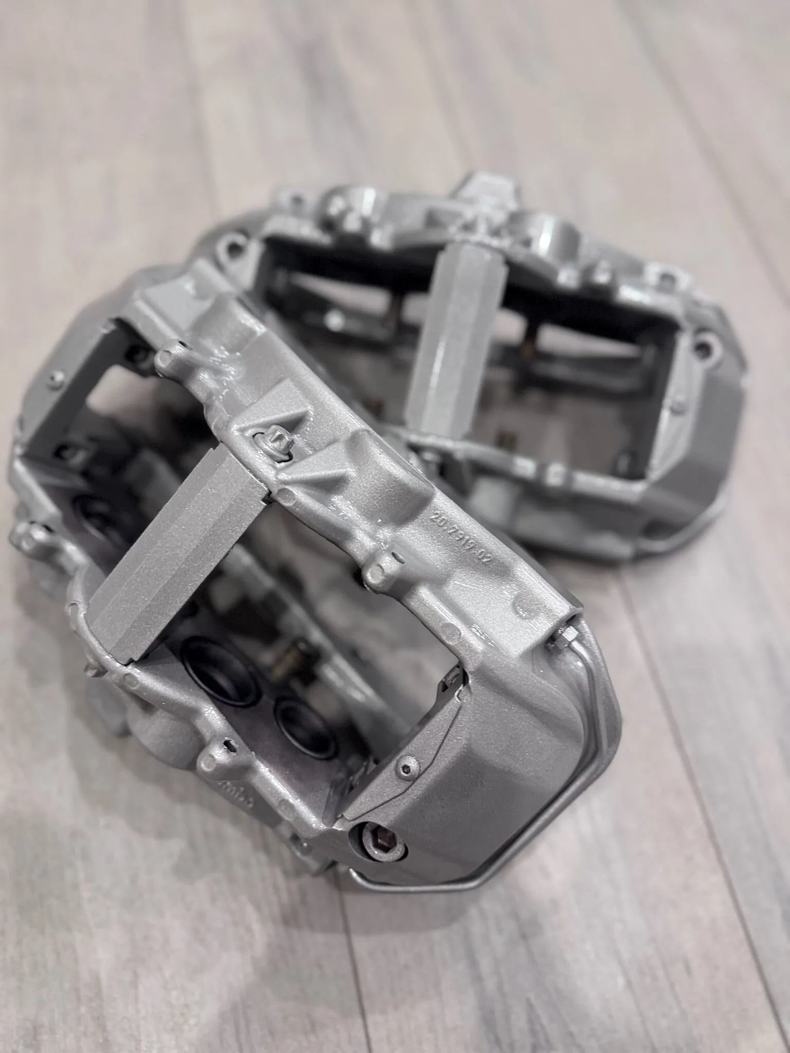 Pair of brake calipers powder coated silver